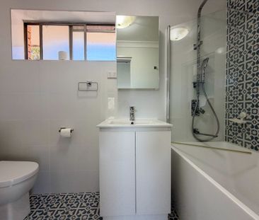 Renovated, Light-Filled & Low-Maintenance Living in the Heart of Pe... - Photo 6