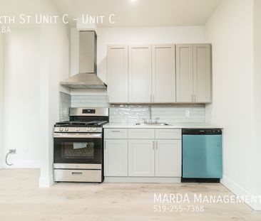 MODERN 2 BED/1 BATH LOCATED IN CHATHAM + HYDRO - Photo 3