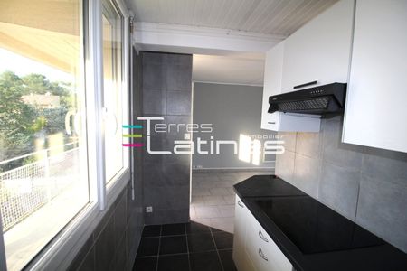 Location Appartement 2 pièces 41m² NIMES 30000 - Photo 4