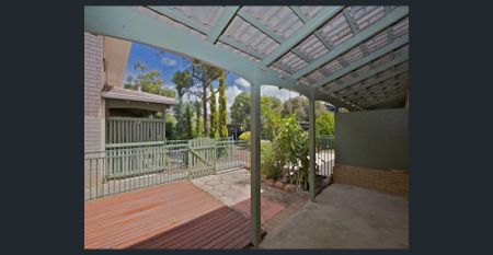 Beautiful Two-Bedroom Unit in Serene Surroundings - Photo 5