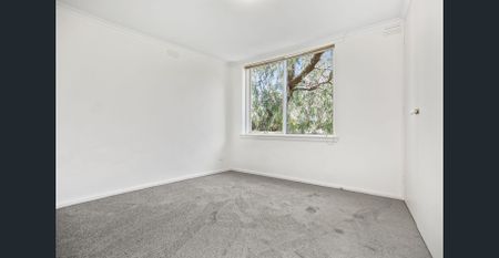 Park Views With An Abundance Of Natural Light - Photo 2