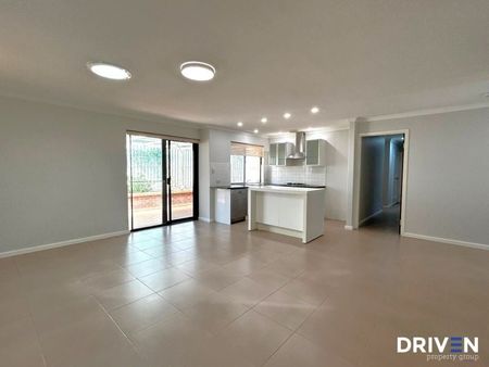 Spacious, Stylish & Elevated Family Living With Sweeping Views - Photo 3