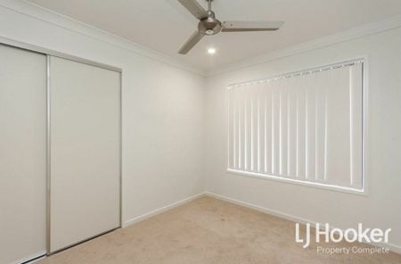 Modern Family Home with Stylish Finishes & Low-Maintenance Living - Photo 4