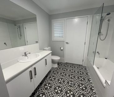 Stylish Modern Home with Ducted A/C & Water Included - Photo 2