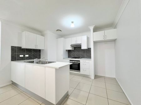Modern Three Bedroom Home in Great Location! - Photo 3