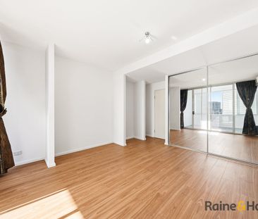 Spacious Dual-Level 2 Bed Apartment with Water Views & Resort-Style... - Photo 4