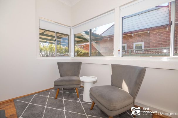 COMFORTABLE CENTRAL FURNISHED HOME - Photo 1