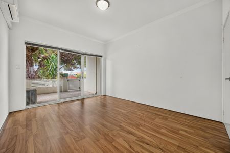 Modern Two-Bedroom Unit with Courtyard! - Photo 2