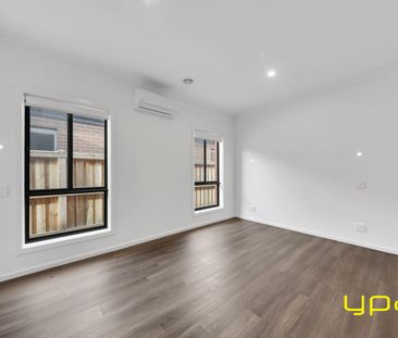 Modern & Spacious 4-Bedroom Home in a Peaceful Beveridge Location - Photo 1