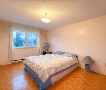 Spacieux appartement de 3 chambres sur deux niveaux, situé au rez-d... - Photo 4