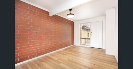 Peaceful, Updated Townhouse in a Leafy Setting - Photo 2