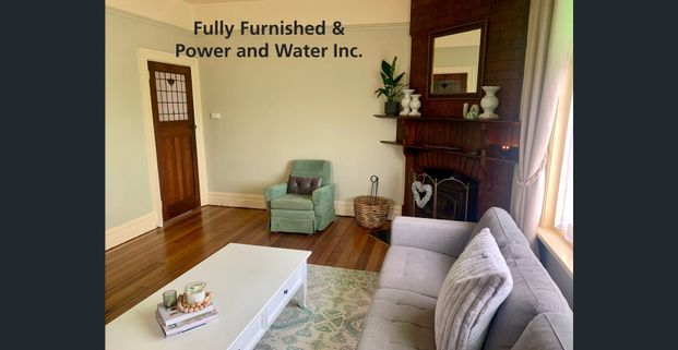 Fully furnished character home in prime location - Photo 1