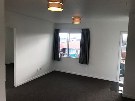 Bright Upstairs Two-Bedroom Unit – Handy Location - Photo 2