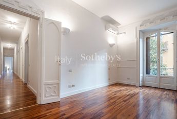 Spacious renovated apartment with balconies in a historic building