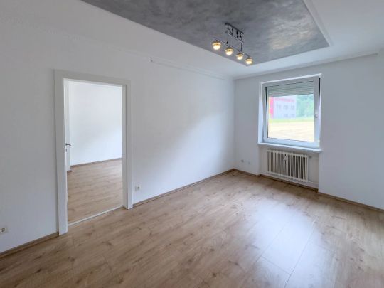 CHARMANTE 2,5 ZIMMER-WOHNUNG IM HOCHPARTERRE - Photo 1