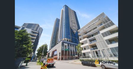 Near New Two-Bedroom Apartment with Water Views and Smart Lock Access in Oasis! - Photo 2