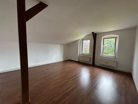 gemütliche 2,5-Raum-Wohnung im DG mit eigenem Gartenanteil - Foto 5