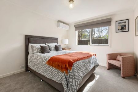 CHARMING VICTORIAN-INSPIRED HOME IN A BRIGHT, LOW MAINTENANCE GARDEN SETTING! - Photo 4