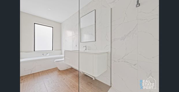 Brand-New 4-Bedroom Designer Home with Double Garage - Photo 1