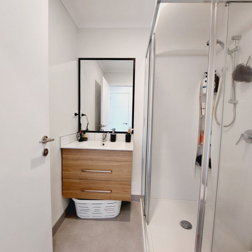 Stylish 2-Bedroom Home with Modern Comforts & Private Outdoor Spaces - Photo 1