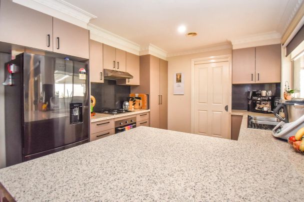 Comfortable & Low-Maintenance Living in a Quiet Location - Photo 1