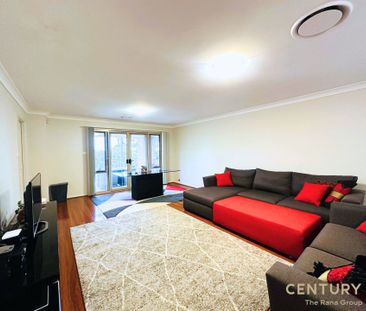 Spacious 6-Bedroom Family Home with Premium Features - Photo 3