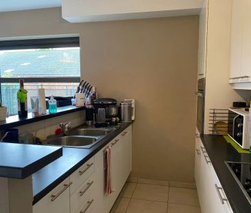 Appartement op de eerste verdieping met 1 slaapkamer, terras en garage - Photo 6