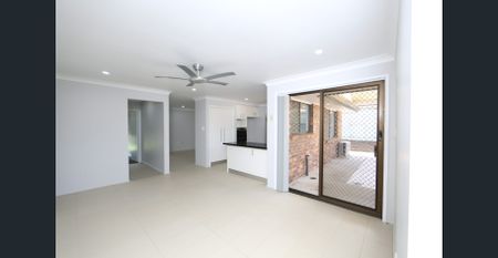 Freshly Renovated Family Home With Pool - Photo 2