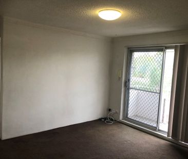 Perfectly Positioned 2-Bedroom Unit - Photo 2