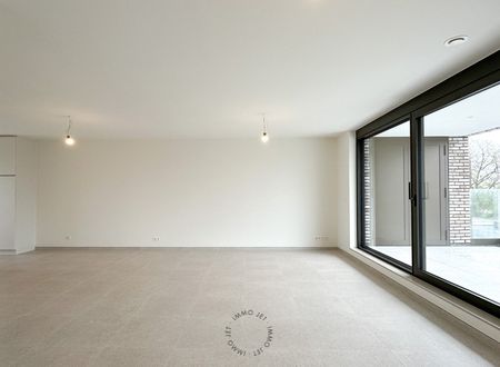 Prachtig gelegen nieuwbouw duplexappartement met drie slaapkamers, groot terras en autostaanplaats - Photo 2