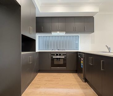 Brand New, Modern & Spacious Living - Photo 2
