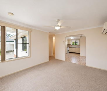 NEAT 3 BEDROOM HOME IN A QUIET WOODRISING CUL-DE-SAC - Photo 2