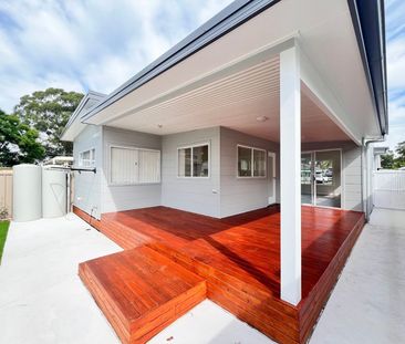 Fully Renovated Family Home with Air Conditioning - Photo 5