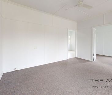 High-set family home in central location - Photo 6