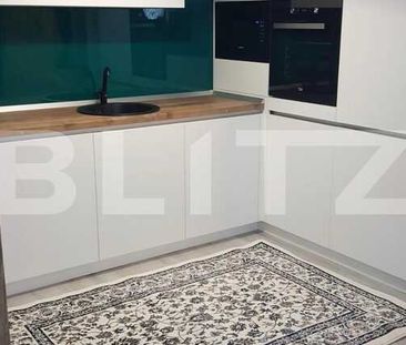 Apartament cu 2 camere, 56 mp , modern, loc de parcare, aer conditionat, zona strazii Trifoiului - Photo 1
