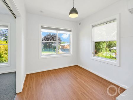 Open the door to coastal living with a sunlit deck retreat - Photo 3