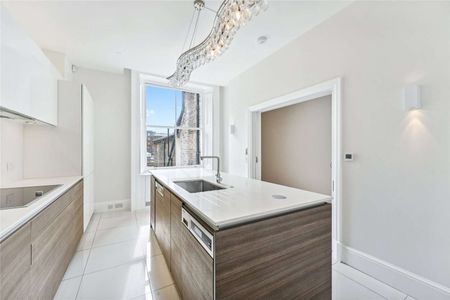 An immaculately presented three double bedroom apartment arranged over the second and third floors of an imposing Grade II listed building in this sought after South Kensington address. - Photo 4