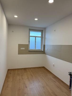 Luxuriöse 2-Zimmer-Wohnung mit Wintergarten und gehobener Ausstattung - Photo 1