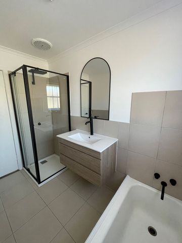 Modern Comfort and Easy Living with Gardener Included - Photo 5