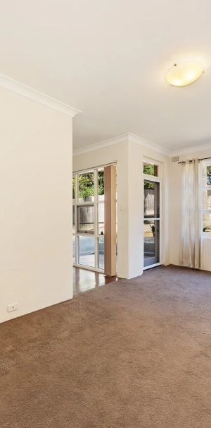 Quiet Light-Filled Apartment Located at Rear of Block - Photo 1