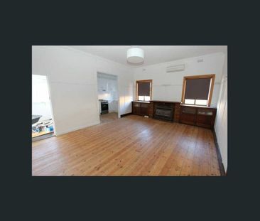 Charming 3-Bedroom Home with Classic Appeal in Prime Location - Photo 4