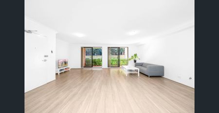 Spacious Ground Floor Apartment with Oversized Living & Entertainer's Balcony - Photo 2