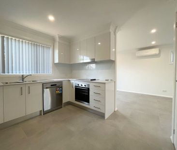 NEAR NEW BEAUTY IN THE HEART OF TOWN - WATER INCLUDED IN RENT - Photo 6