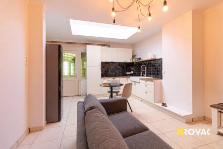 Verzorgde rijwoning met grote tuin! - Photo 2