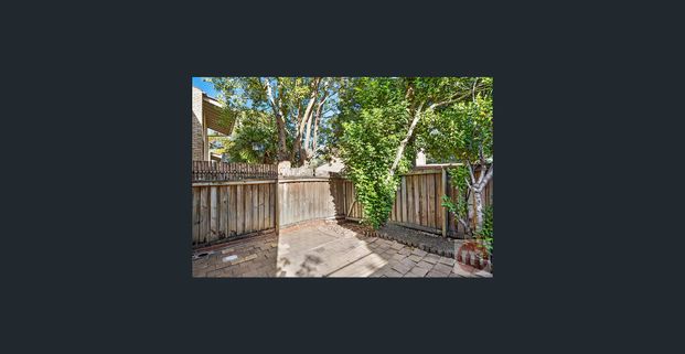 STYLISH TOWNHOUSE IN PEACEFUL SURROUNDINGS! - Photo 1