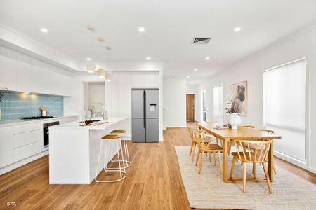 Brand New Designer Duplex Offering Space, Style & Family Comfort - Photo 2