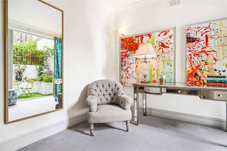 A charming one bedroom apartment with a private patio garden. - Photo 3