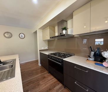 Spacious 4-Bedroom Home with Two Living Areas and Modern Upgrades - Photo 1