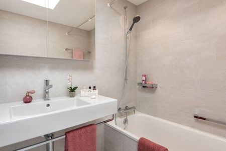 A bright attic apartment awaits you - Photo 4