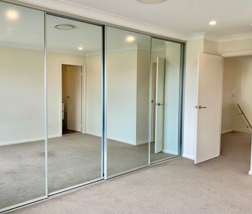 GENEROUS MULTI LEVEL TOWNHOUSE IN A MODERN COMPLEX - Photo 3